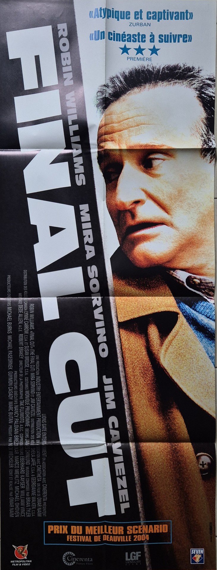 Affiche officielle du film Final Cut réalisé par Omar Naim (2004) avec Robin Williams et Mira Sorvino.